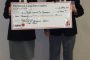 A donation from the Salute to Veterans project is presented to Branch #71